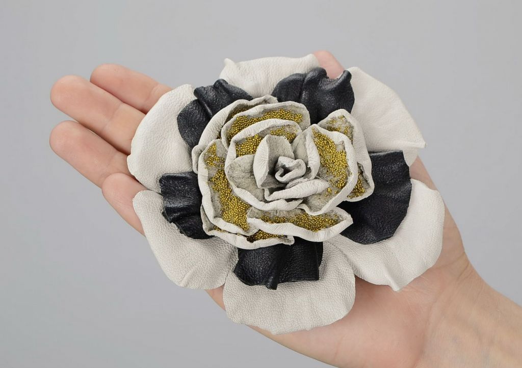 Handmade leather brooch in the form of a flower