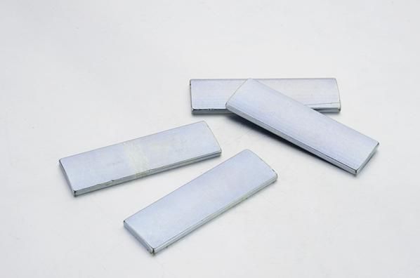 Rectangular magnet and permanent magnet