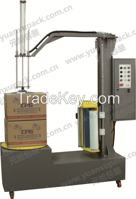 Carton wrapping machine