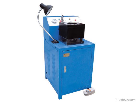 Nut crimping machine