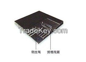 Embedded coil tear-resistant conveyor belt