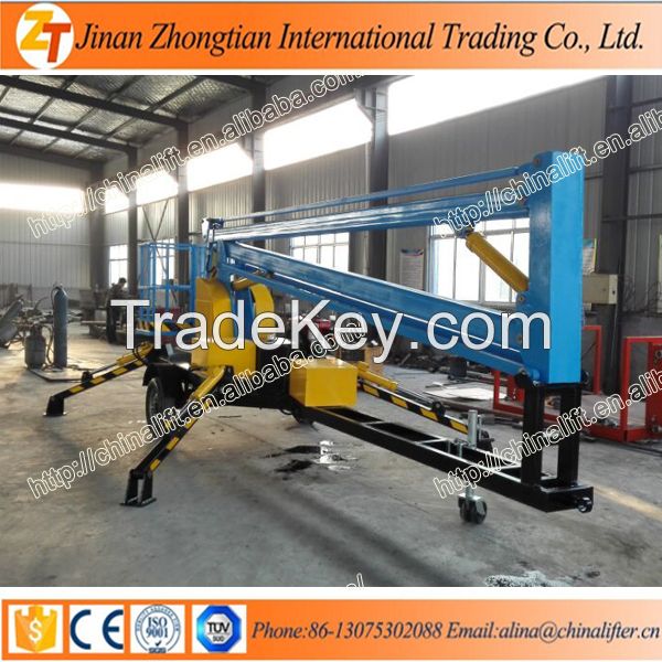 Articulated boom lift platform trailing driven lift workform