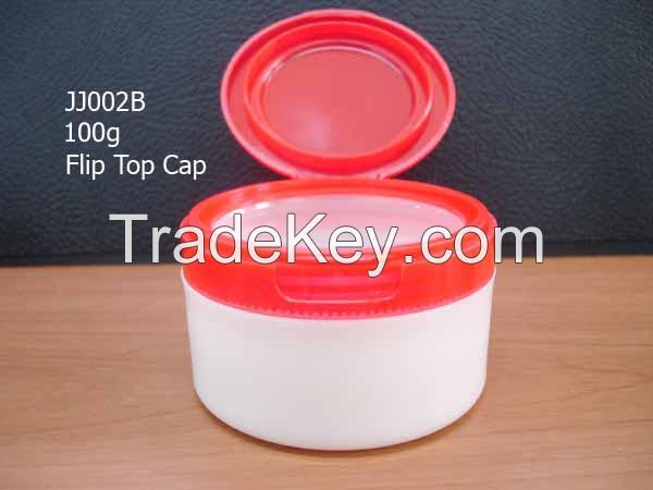 Cosmetic jar with flip top cap