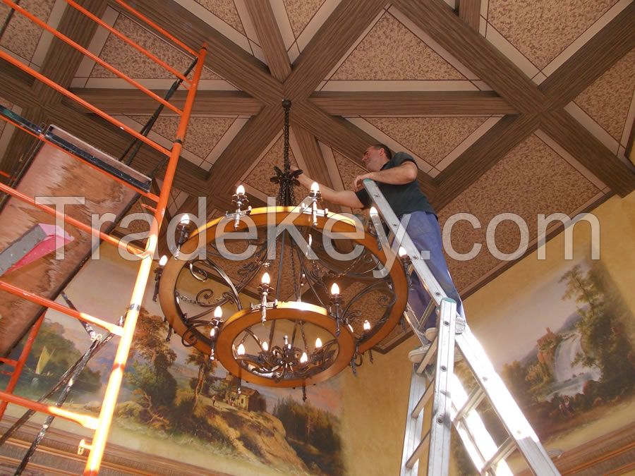 Forged Chandelier Stylized As A Cart Wheel