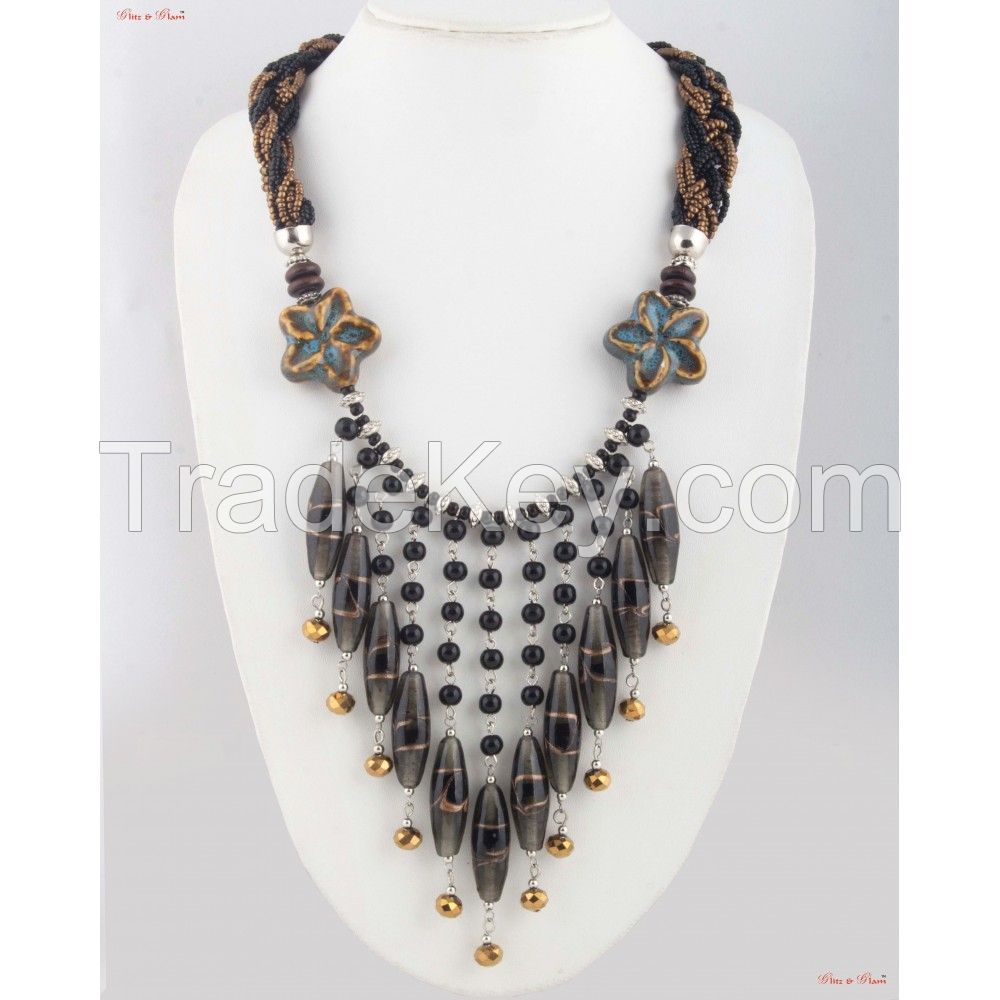 Fashion Necklaces - Dangle neck piece attached to a zigzag patterned cloth with a little bit of floral inspiration.