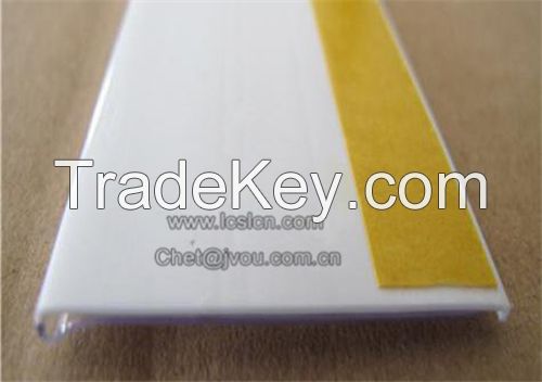 Supermarket shelf edge strip with self adhesive tape