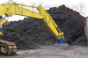 Excavator Using Lifting Electromagnet for Steel Scraps