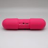 Pill shape portable mini sense induction vibration speaker with dock station 