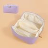 Large Capacity PU Leather Weave Cosmetic Bag Women Portable Travel Makeup Bag With Handle and Divider Flat Lay