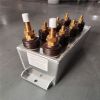 Water cooled capacitors for electric heating installations