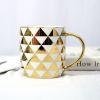 Gold Handle Coffee Mug...