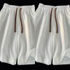 White sports shorts su...