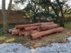 TROPICAL HARDWOODS ON PEELED LOGS