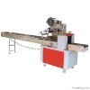 Flow wrapper packaging machine