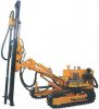 Tracked drilling carriage