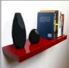 red floating shelf wit...