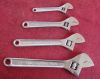 Adjustable wrenches