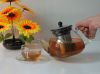 glass teapot with stra...