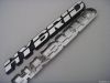 car emblem, car badge, chrome auto emblem
