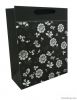 Promotional paper carrier bag with silver stamping flowers