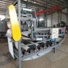Solid material dewatering belt filter press