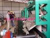 Solid material dewatering belt filter press