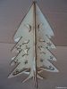 wooden indoor christmas tree with snowman