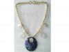 Shell on pearl chain n...