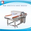 Auto-Conveying Metal Detector