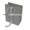 Paper bag with handle, glossy lamination