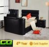 modern king size leather bed with tv in footboard