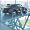 stationary vertical car lift in car garage