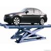 stationary vertical car lift in car garage