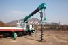 Auger attached crane