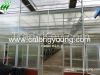 Glass greenhouse comme...