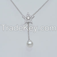 Beautiful star shape pendant necklace with cubic zirconias and pearl