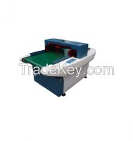 Conveyor belt garment metal detector