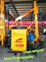 Rock drilling machine pile driver with dust remover for hard construction site