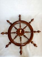 Wooden clock model of steering yacht