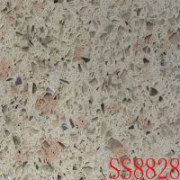 Quartz stones with cream-colored background and slight pink and green patches