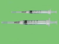 Disposable safety retraction syringe with needle