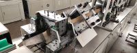 High-speed paper angle protection and punching machine