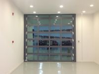 Industrial transparent sectional door