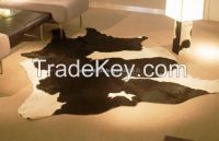 Black and white cowhide rug