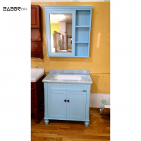 navy blue painted wood bathroom vanity