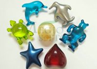 Shaped soft bath oil capsules