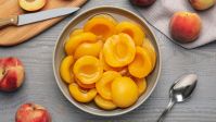 PREMIUM CANNED PEACH HALVES IN HEAVY