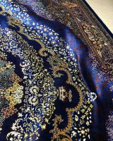 Hand-knotted 100% silk Persian carpet From UK