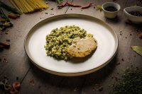 Sous-vide chicken fillet with rice spinach and vegetables