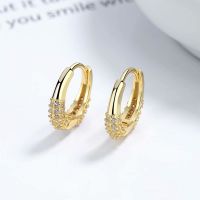 gold hoop ear